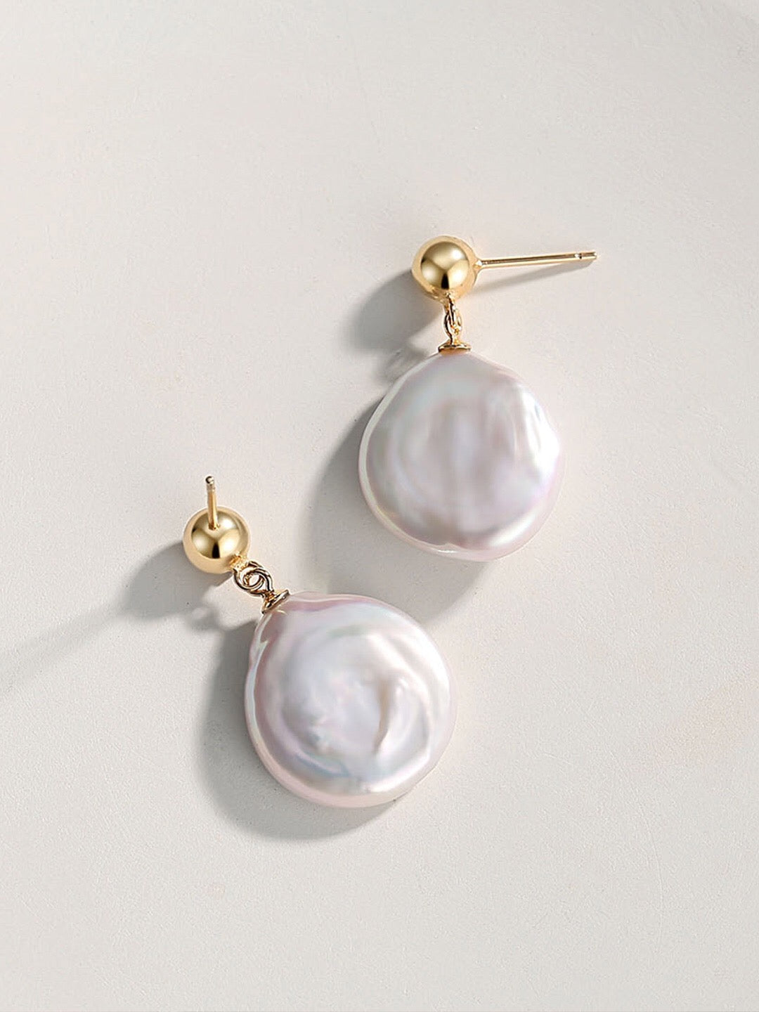 Boucles d'oreilles pendantes irrégulières en perles baroques