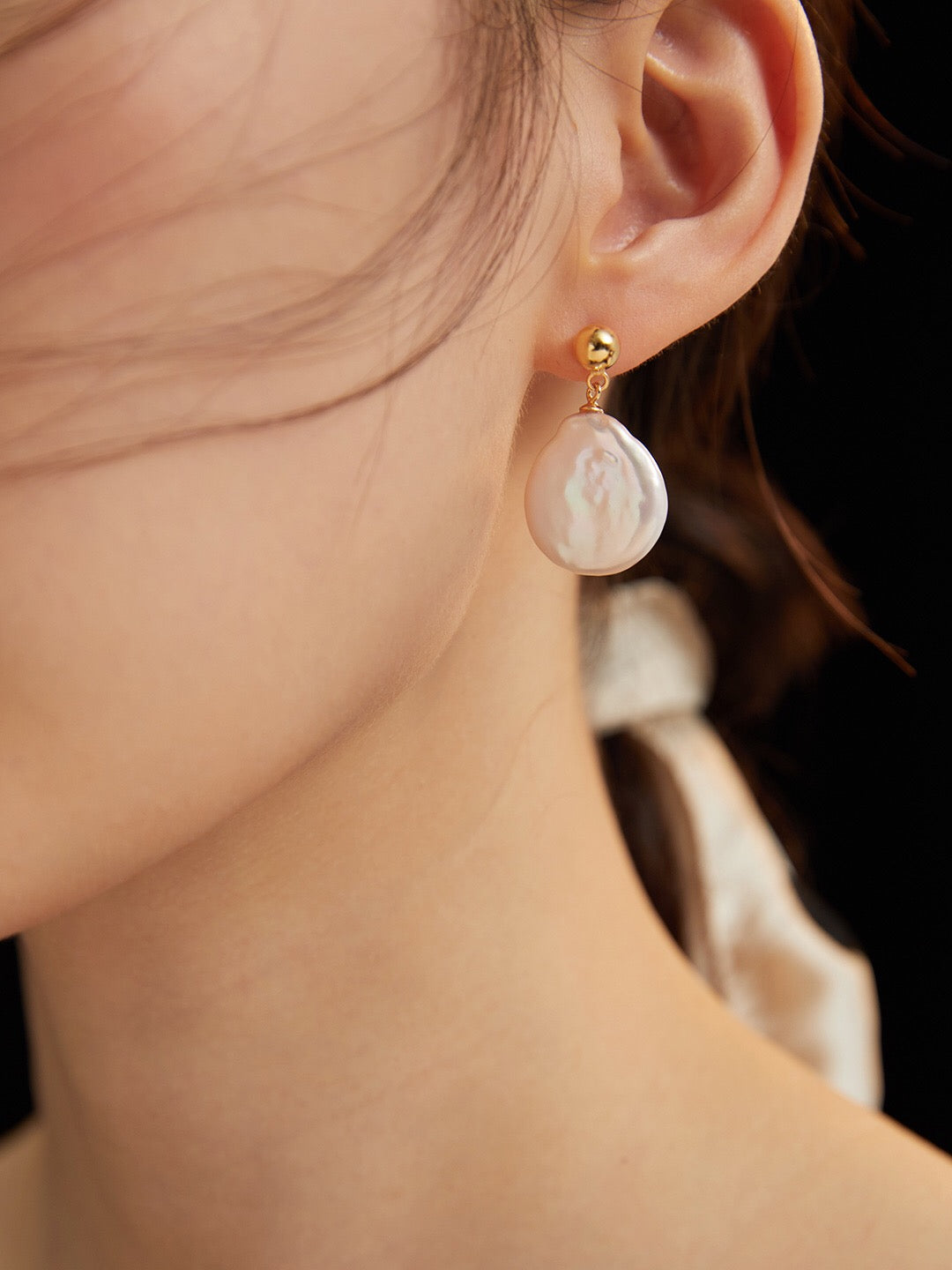 Boucles d'oreilles pendantes irrégulières en perles baroques