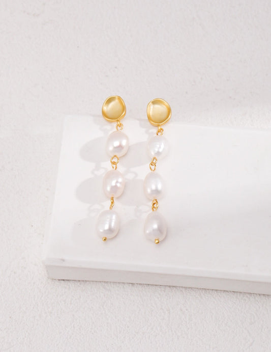 Boucles d'oreilles pendantes longues en perles baroques