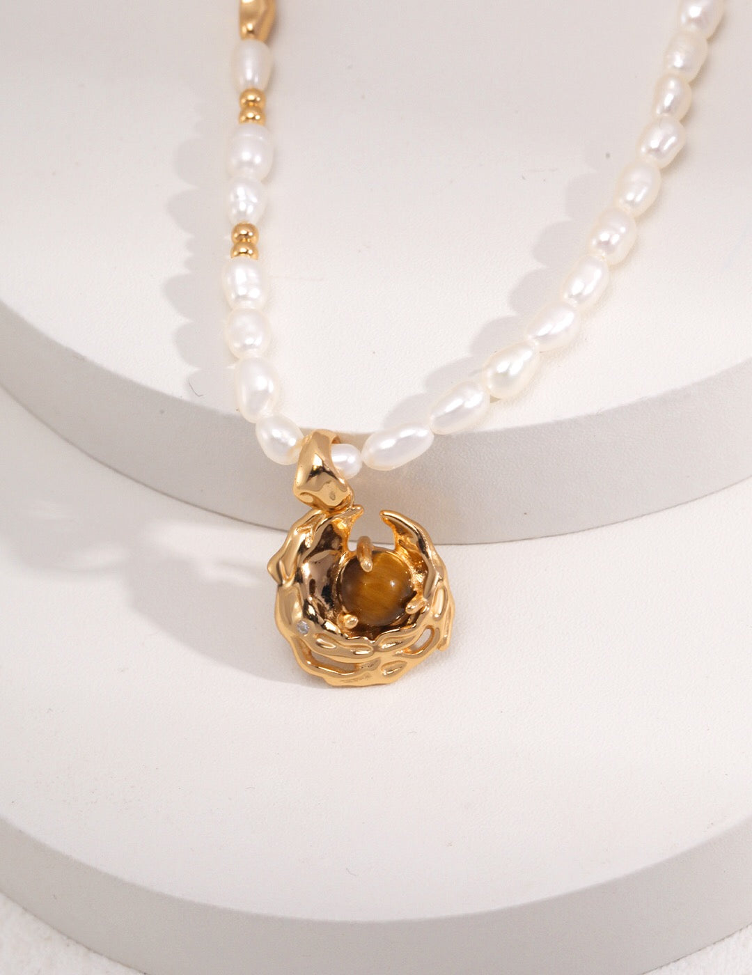 Detailed macro shot showing natural tiger eye stone texture and pearl luster