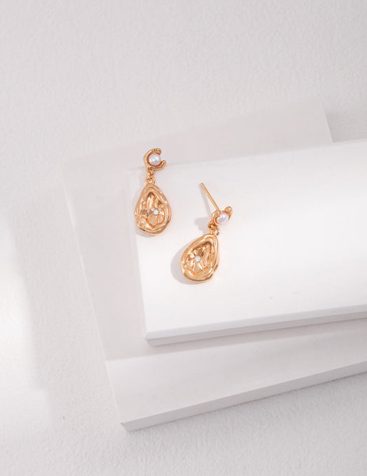 Boucles d'oreilles délicates en forme de goutte de perles en zircon