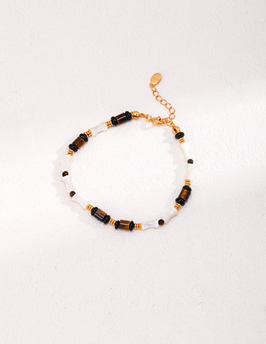 Armband aus Tigerauge-Stein und schwarzer Achat-Muschel