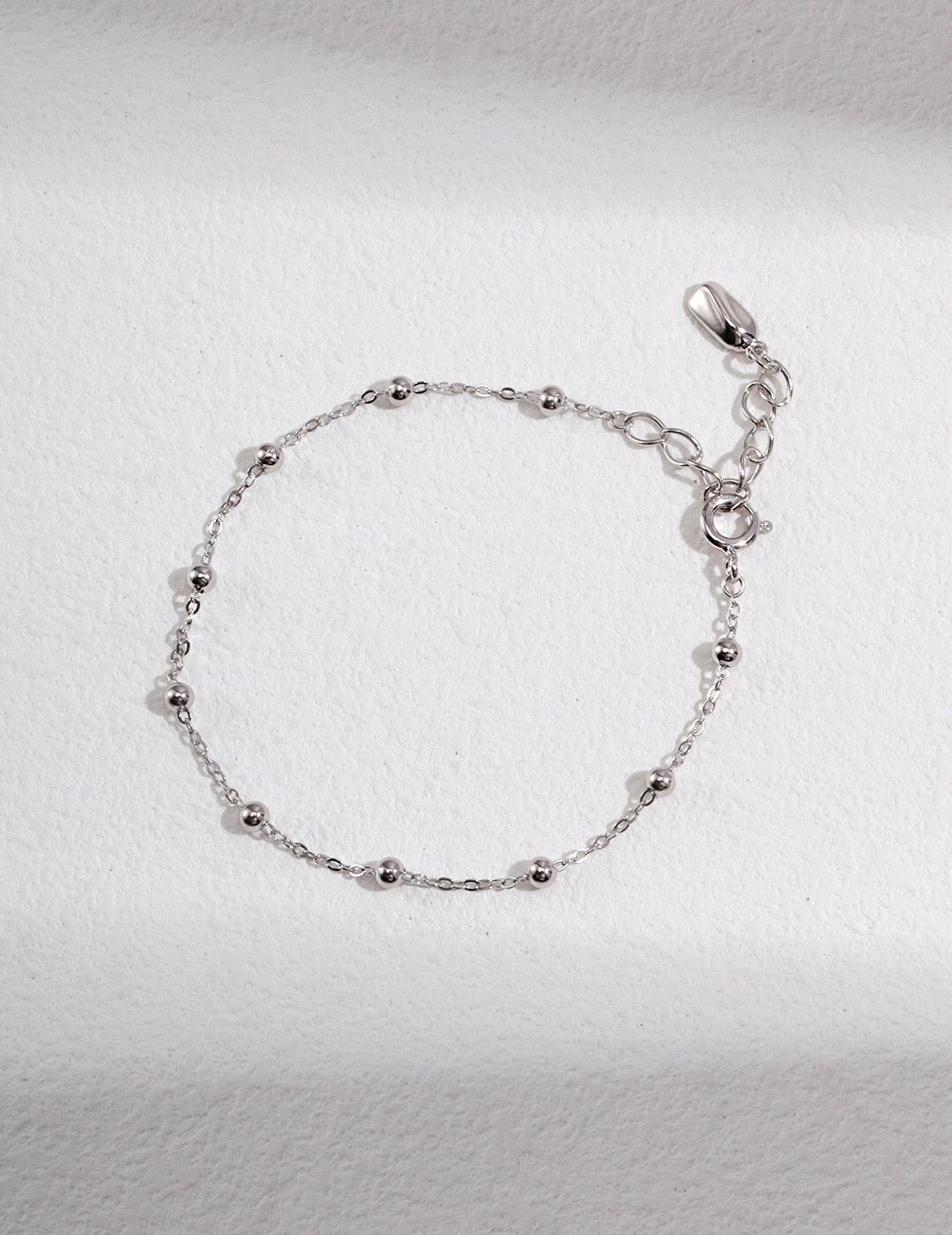 Goldfarbenes Perlenkettenarmband