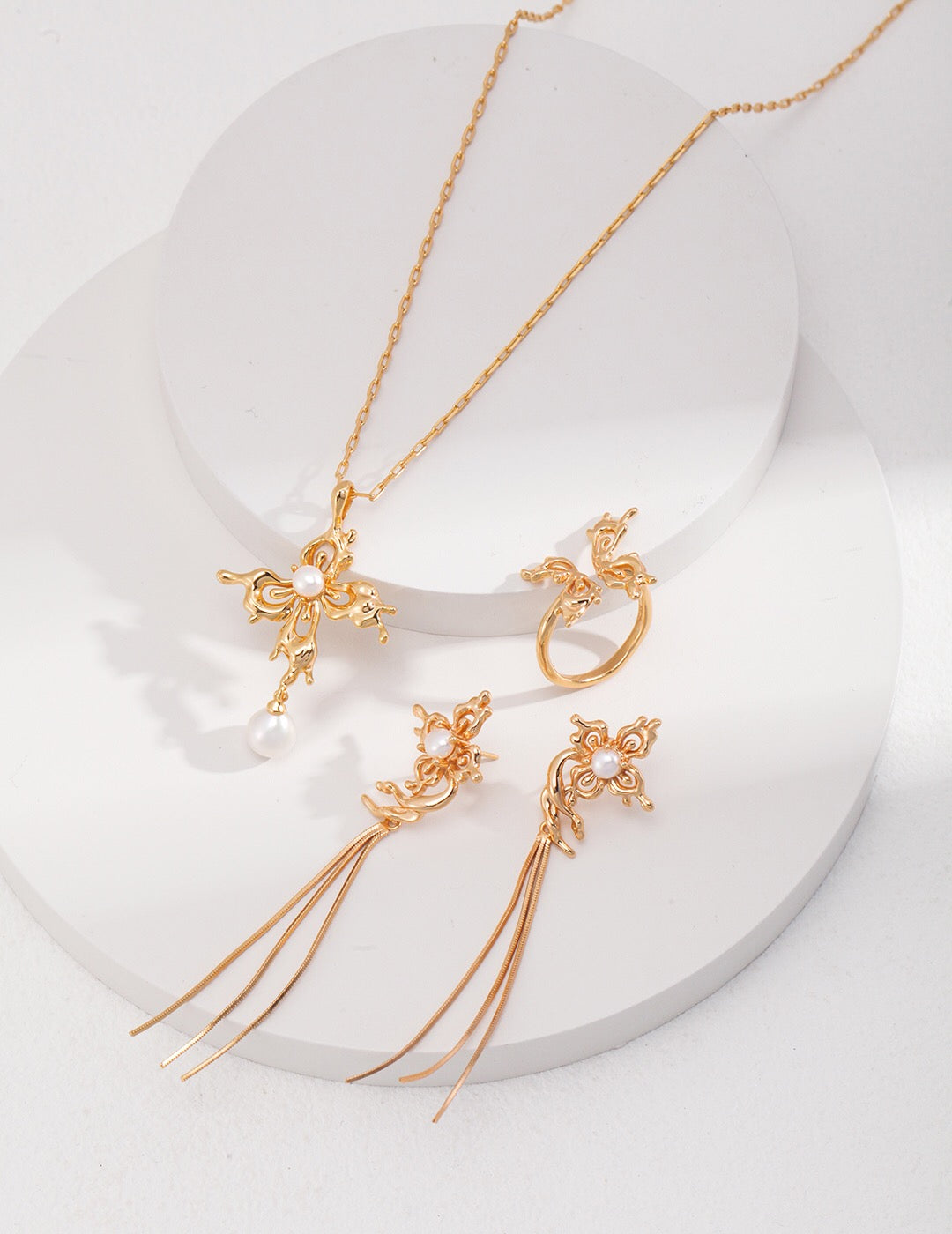 Gold vermeil featuring delicate butterfly wing design