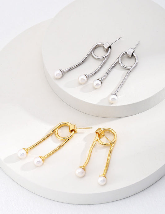 Boucles d'oreilles à deux perles au style unique