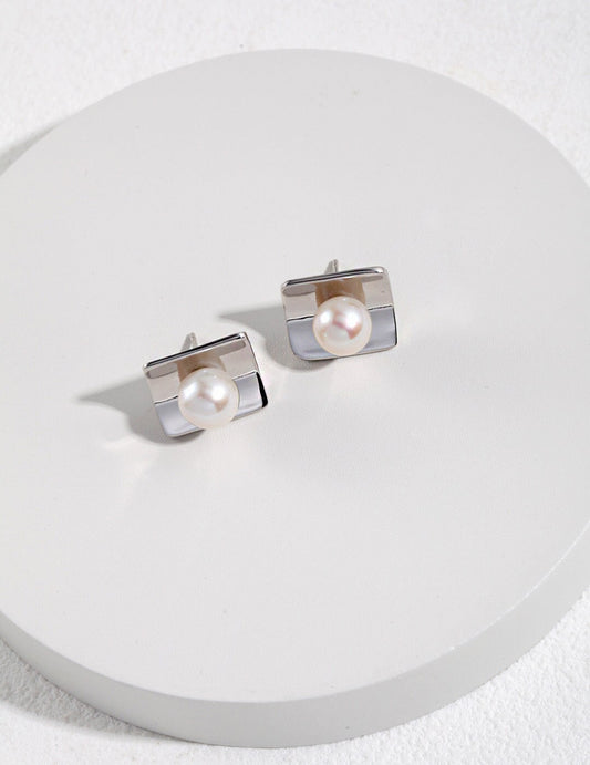 Macro view of square freshwater pearls – Fernovia Design studs in sterling silver