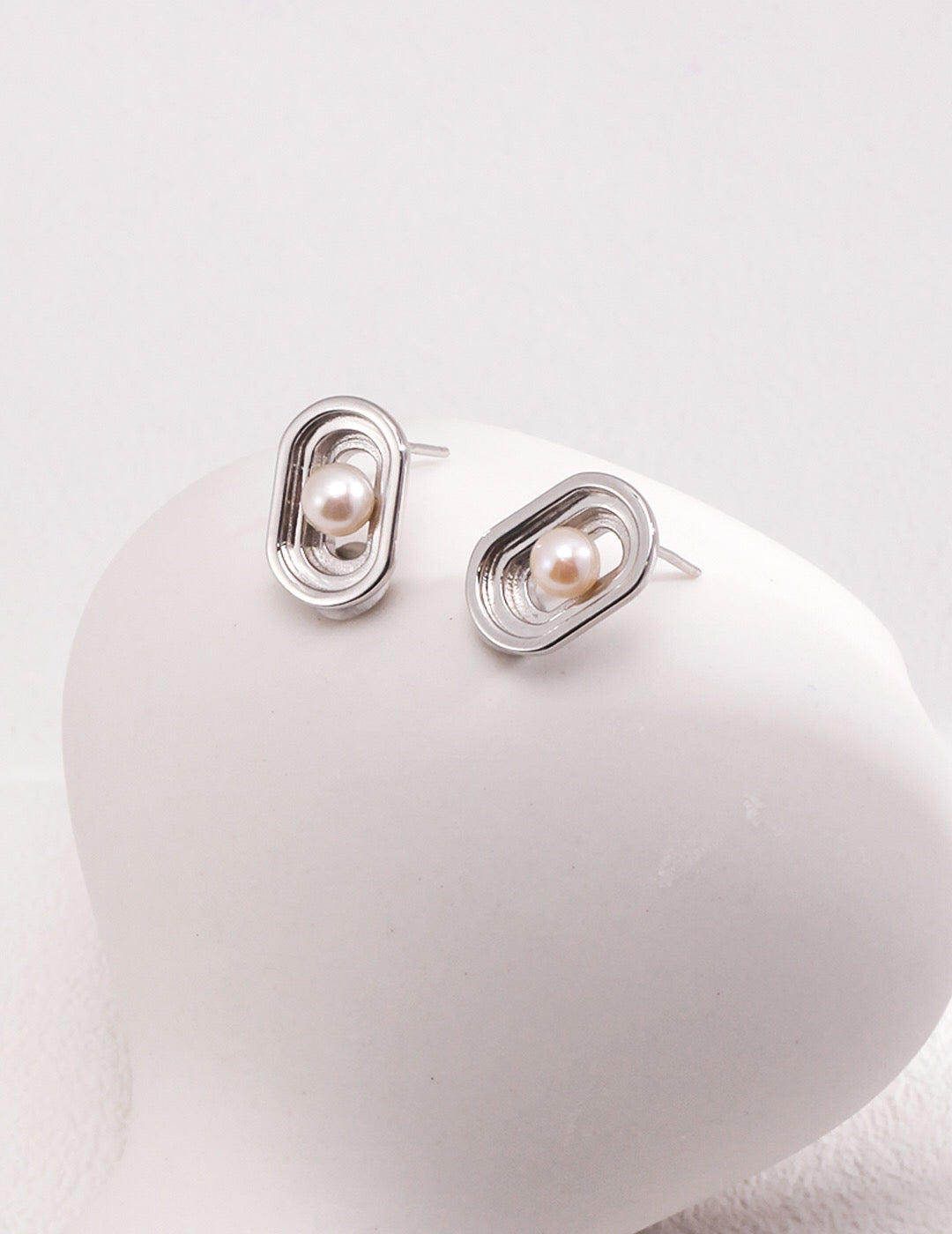 Oval Hollow Pearl Stud Earrings in sterling silver by Fernovia Design – minimalist nature‑inspired design
